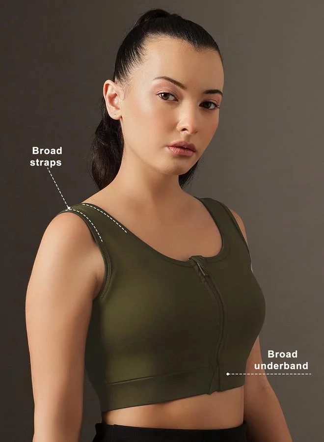 Clovia  Dark Green Solid Medium Impact Zip-Front Sports Bra for Women | Best Price UAE