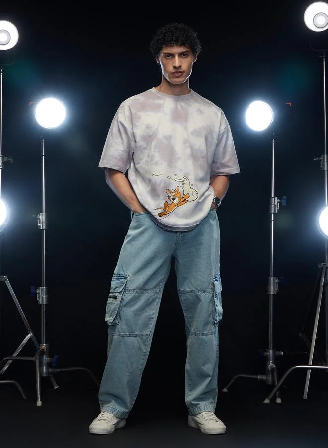 ذا سوليد ستور تيشيرت فضفاض بطبعة جرافيك جيري وتأثير صباغة الربط