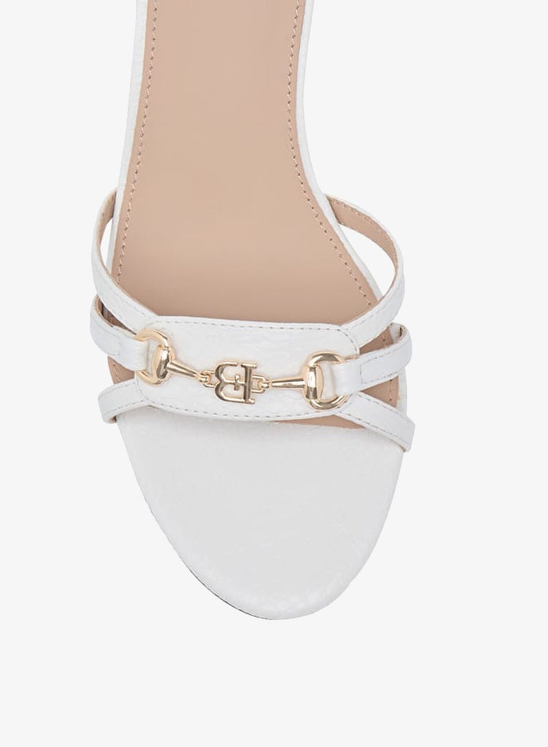 فلورا بيلا من شو إكسبرس صنادل نسائية سهلة الارتداء بكعب عريض وزخرفة شعار - Image 4