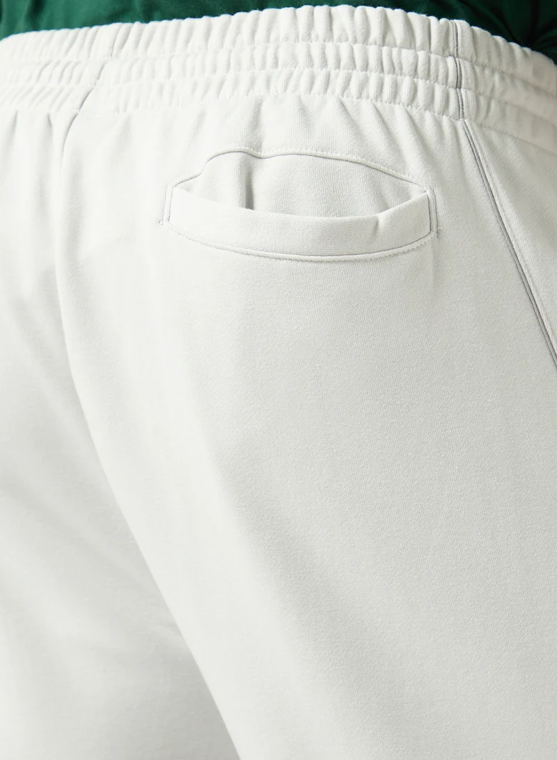 New Balance GREY MATTER (GYM) Trackside French Terry Sweatpants for Men | Best Price UAE