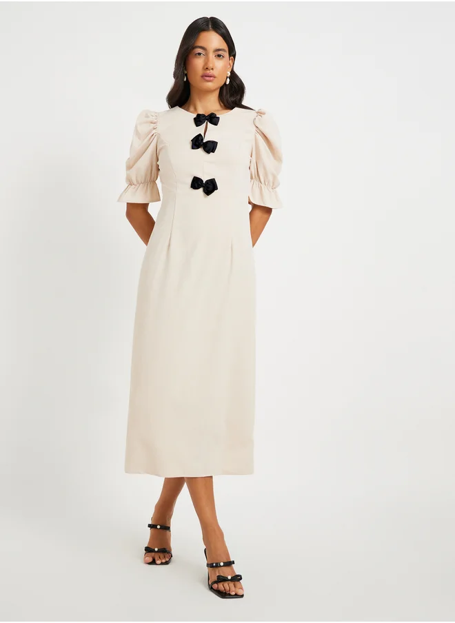 ستايلي Texture Puff Sleeves Bow Detail Midi Dress