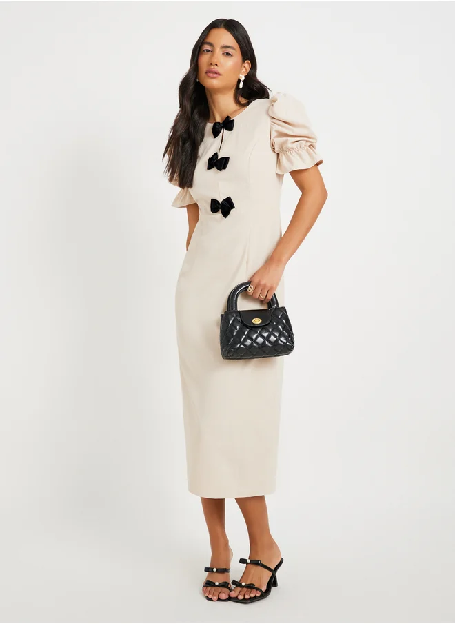 ستايلي Texture Puff Sleeves Bow Detail Midi Dress