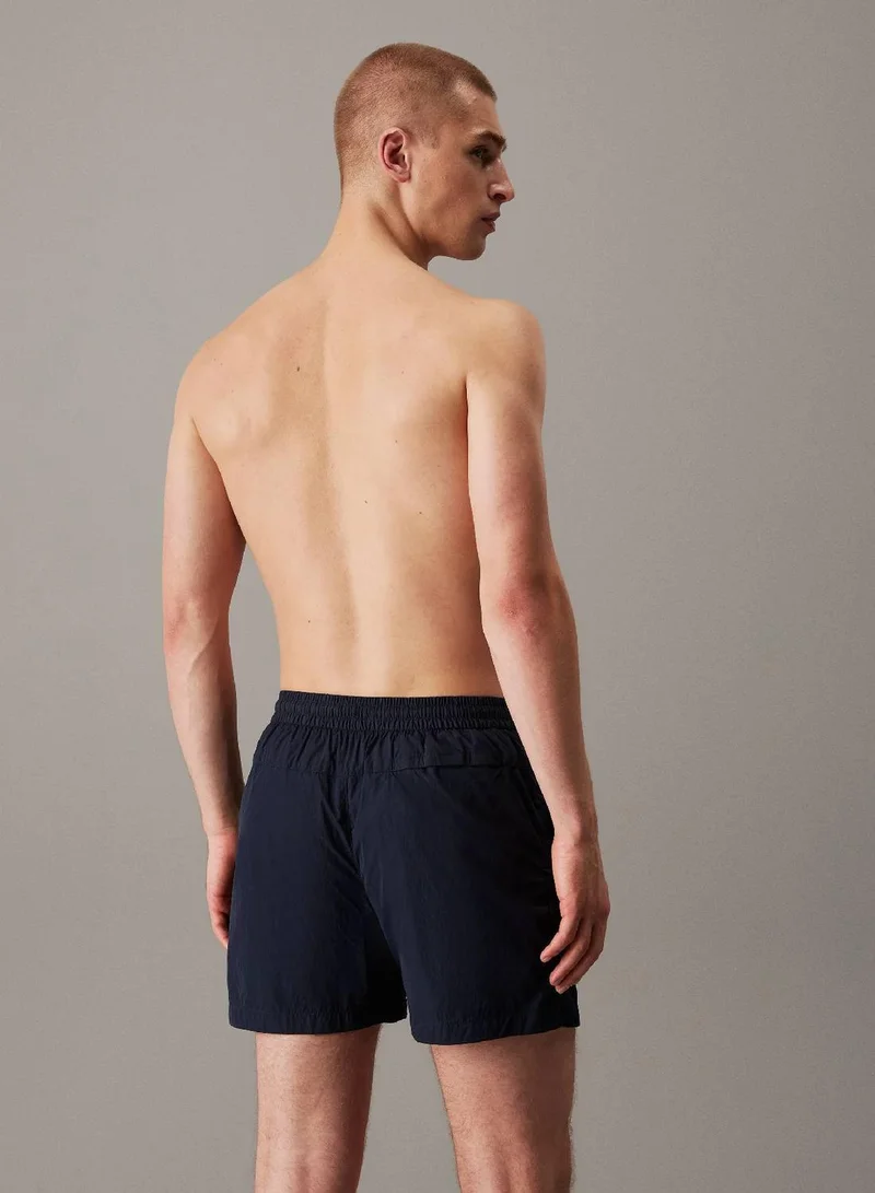 Calvin Klein Jeans Dark Sapphire Medium Drawstring Swim Shorts - CK Soft Nylon for Men | Best Price UAE