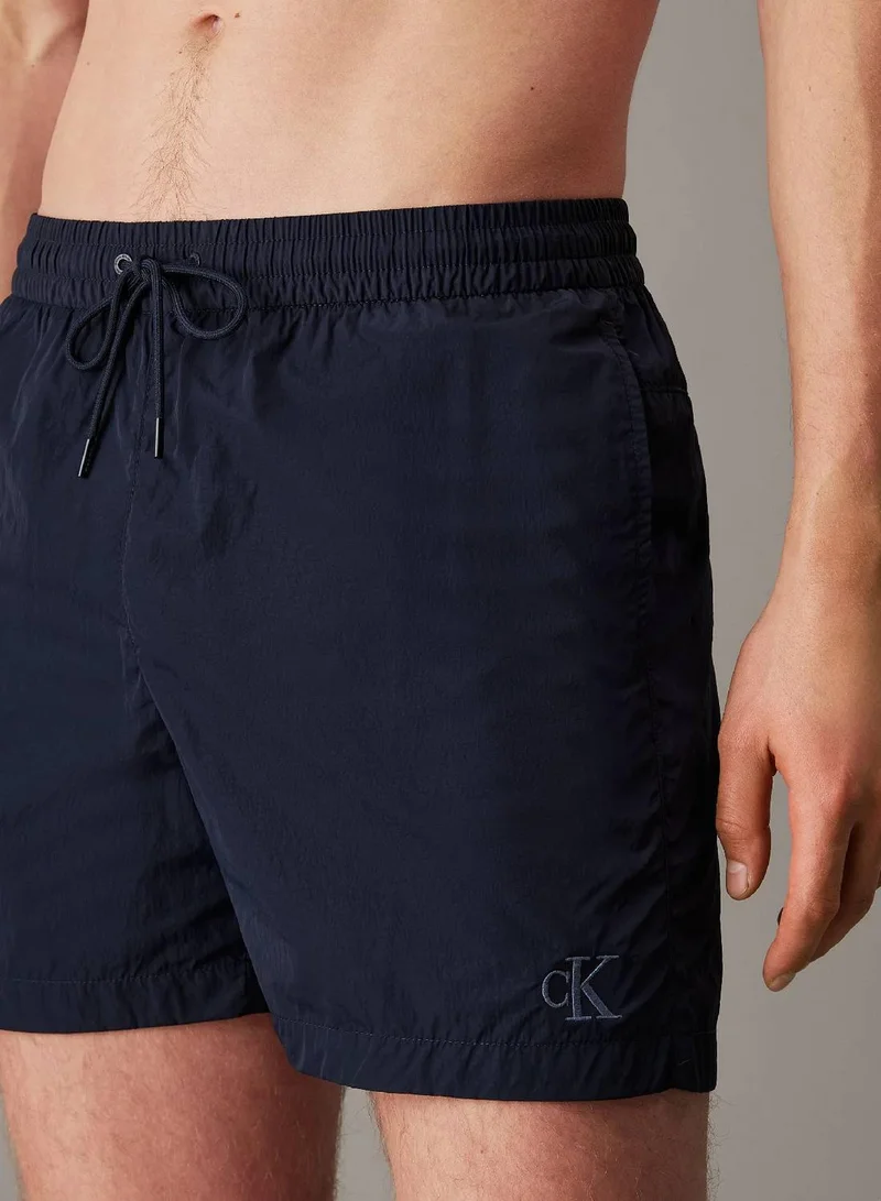 Calvin Klein Jeans Dark Sapphire Medium Drawstring Swim Shorts - CK Soft Nylon for Men | Best Price UAE