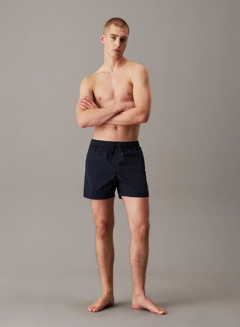 Calvin Klein Jeans Dark Sapphire Medium Drawstring Swim Shorts - CK Soft Nylon for Men | Best Price UAE