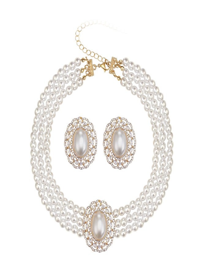 بريلوف مجوهرات بريلوف من اللؤلؤ الصناعي المستوحى من حقبة غاتسبي في عشرينيات القرن الماضي، مثالية لحفلات الأزياء التنكرية. طقم رائع من ثلاث طبقات من اللؤلؤ الصناعي بتصميم عتيق، مرصع بأحجار الراين، يتضمن قلادة وأقراط مرصعة، مثالي لحفلات التخرج والمناسبات الرسمية. - Image 1