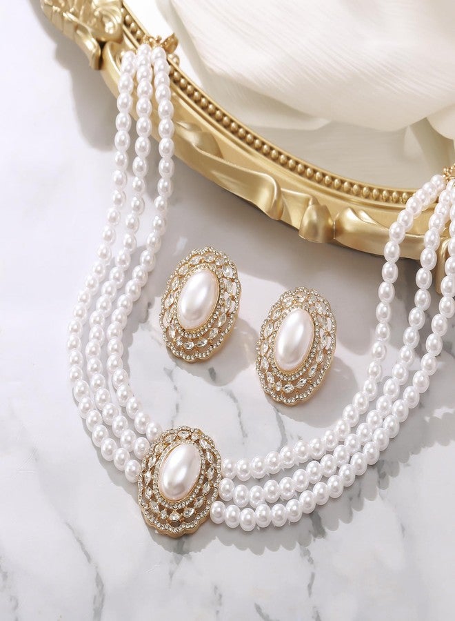 بريلوف مجوهرات بريلوف من اللؤلؤ الصناعي المستوحى من حقبة غاتسبي في عشرينيات القرن الماضي، مثالية لحفلات الأزياء التنكرية. طقم رائع من ثلاث طبقات من اللؤلؤ الصناعي بتصميم عتيق، مرصع بأحجار الراين، يتضمن قلادة وأقراط مرصعة، مثالي لحفلات التخرج والمناسبات الرسمية. - Image 5