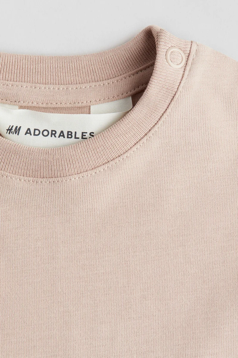 اتش اند ام تي-شيرت واسع من قطن بيما