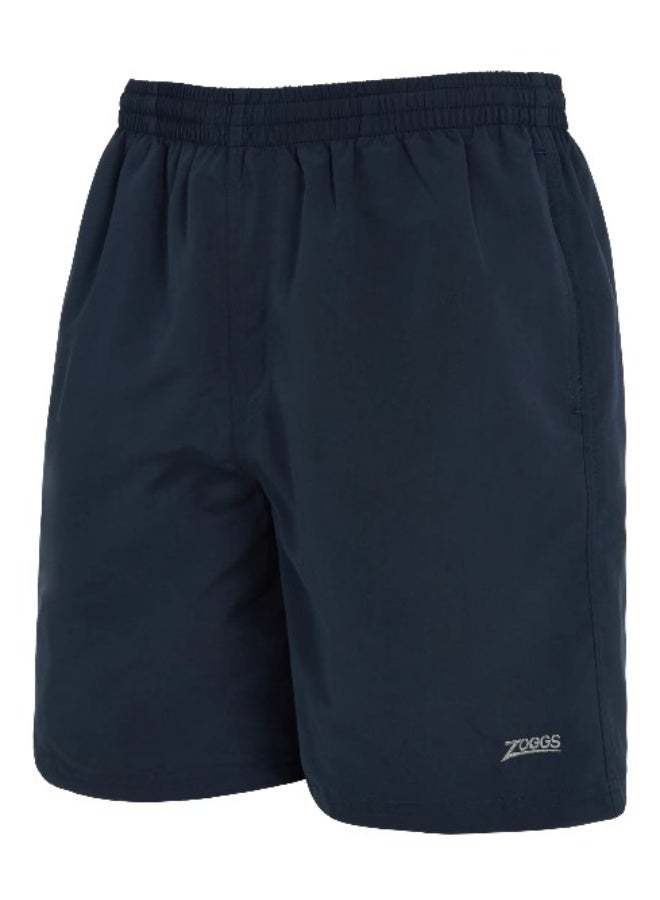 زوجس شورت سباحة رجالي زوجز بنريث 17 كحلي | قماش إيكودورا مستدام، طول منتصف الفخذ 17 بوصة، مقاوم للكلور، حماية UPF50+، خصر قابل للربط، مبطن بشبكة وجيوب للسباحة اليومية | 462924-NV-S - Image 1