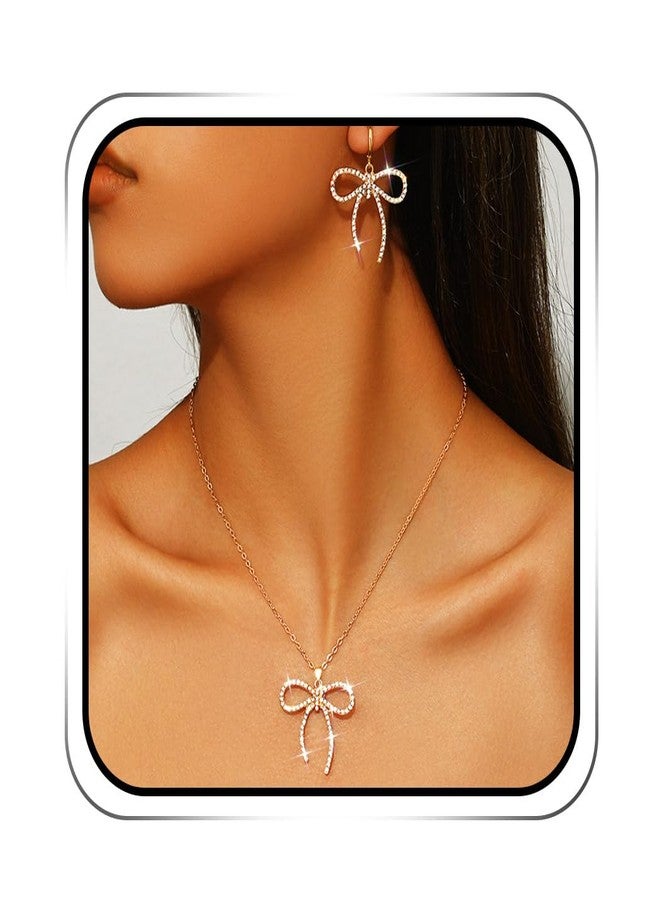 ايفينت طقم مجوهرات EARENT على شكل فيونكة، قلادة مرصعة بأحجار الراين الذهبية، طقم قلادات لعيد الميلاد ورأس السنة الجديدة للنساء - Image 1