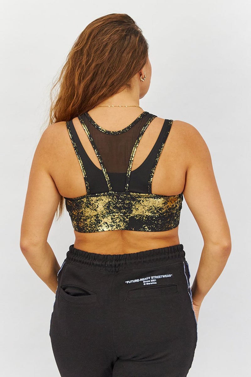 PUMA Women Sportswear Fit Sleeveless Training Sports Bra, Black and Gold  - Image 2