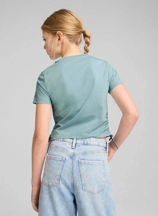 بوما تيشيرت شبابي بطبعة حب متوهجة وعقدة