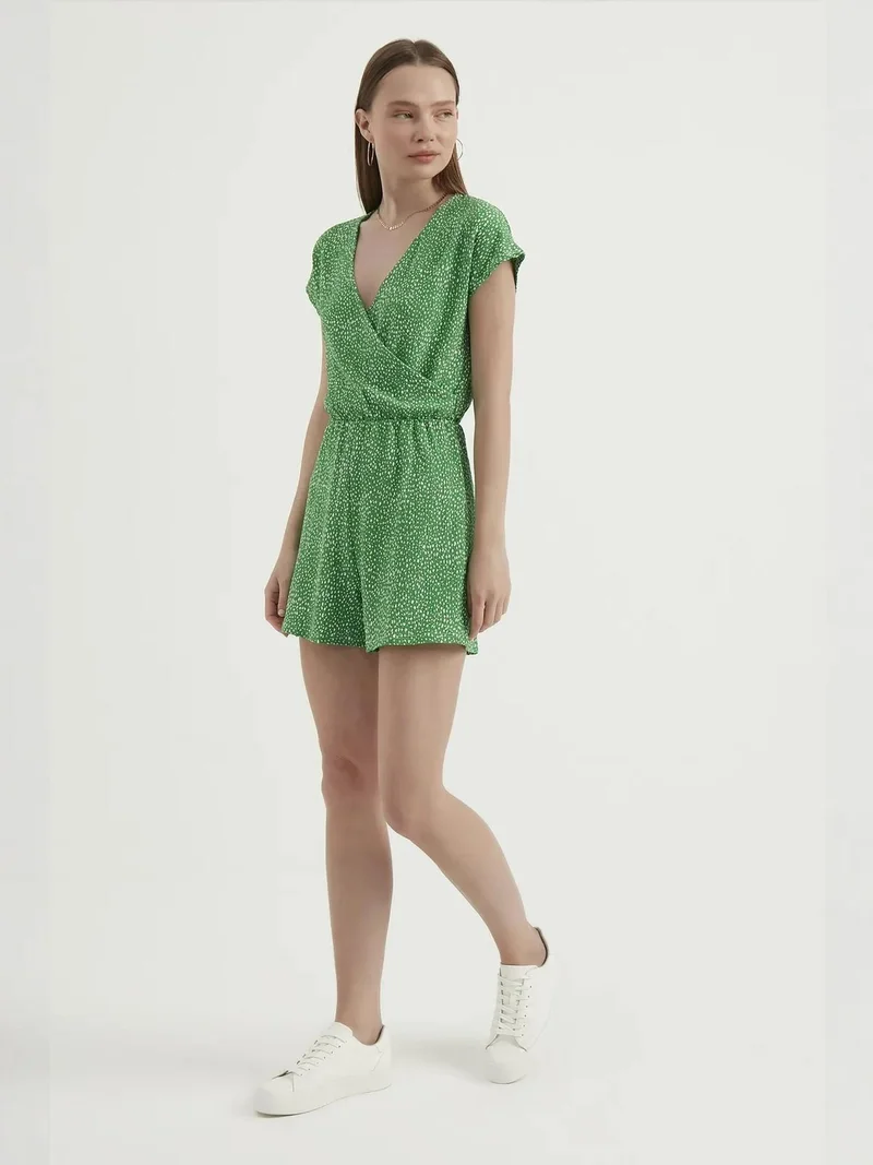 زوبعة جمبسوت قصير بأكمام قصيرة وفتحة رقبة على شكل حرف  وطبعات زهور وطيات