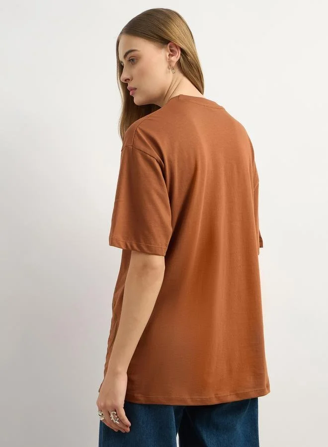 Styli Graphic Print Oversized Round Neck Longline T-Shirt
