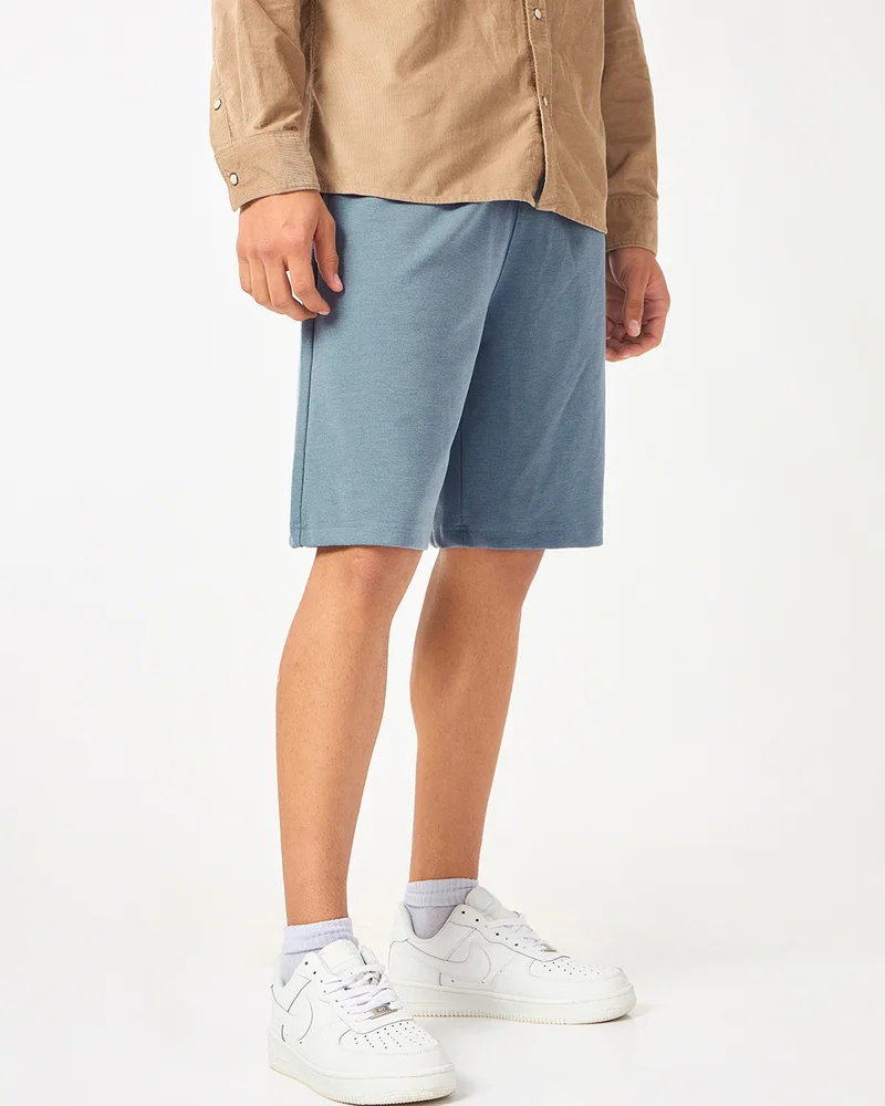 بيواكوف شورت رجالي واسع أزرق بترولي