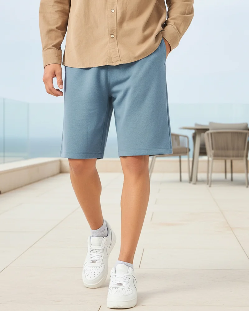 بيواكوف شورت رجالي واسع أزرق بترولي