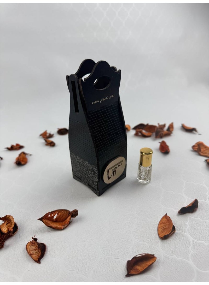 Samrix Magic Box:  Magic Box - A wooden gift box containing a quarter tola of oud oil.  ✔ Luxurious Magic Box with an elegant wooden design  ✔ Contains a quarter tola of oud oil  ✔ Suitable for upscale gifts ✔ Long-lasting and luxurious oud fragrance ✔ Sophisticated design reflecting refined taste ✔ Ideal for weddings and special occasions ✔ Perfect choice for elegant gifts ✔ High-quality wood materials ✔ Suitable size for gifts ✔ Reflects authenticity and Arabian luxury ✔ Suitable for corporate gifts ✔ Elegant packaging, ready for presentation ✔ High value for a distinctive product ✔ A simple gift with a touch of luxury ✔ Suitable for religious occasions ✔ Practical and portable design ✔ Leaves a luxurious impression on the recipient ✔ An ideal choice for oud oil lovers - Image 2