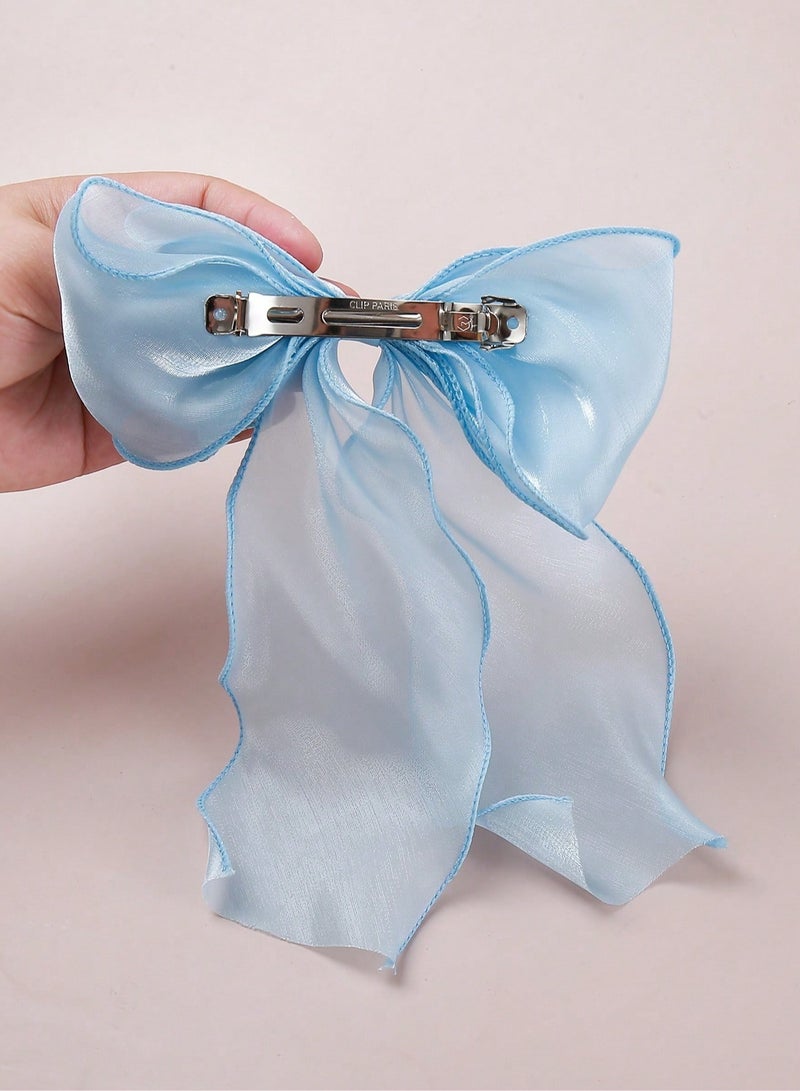 Wavy Bow Hair Clip in French Style with a blue Color – Suitable for Girls and Young Women. Features a strong clip that holds securely without slipping. - Image 3