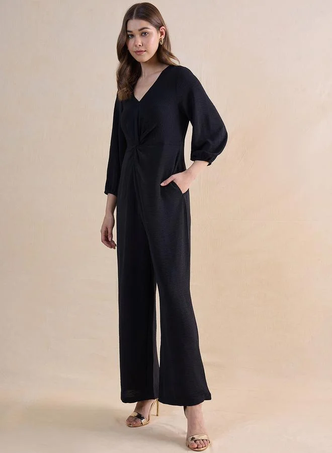 Femmella Black Plain Jumpsuit with Twist Detail