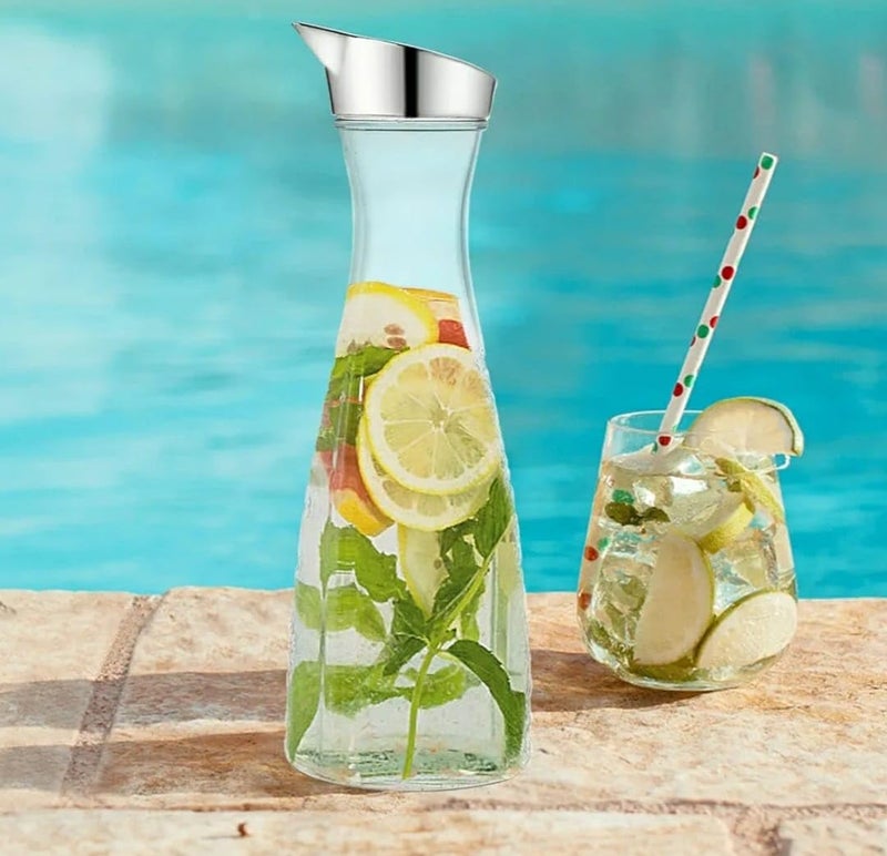 Shoppers Hub PNQ 1.1L PC Transparent Decanter Juice Water Bottle with Silver Cap and Self Embossed Design Pattern for Ideal Gifting and Heavy Duty Use in Homes, Hotels, Cafes and Commercial Places  - Image 5