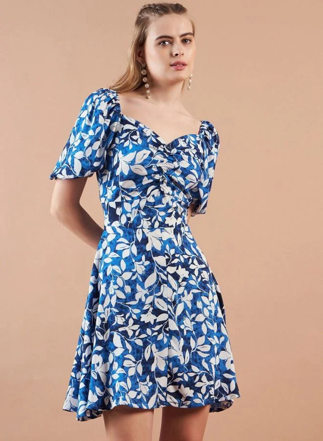مرفوعة Women Fit and Flared Floral Printed V-Neck Short Sleeve Mini Dress
