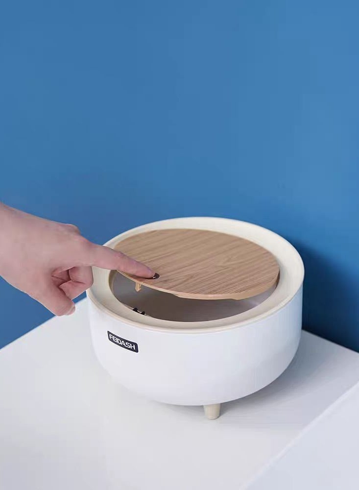 A basket, but the shape is a very chic piece of furniture that brightens up any part of the house, and also the touch cover is easy to use.IR  - Image 2