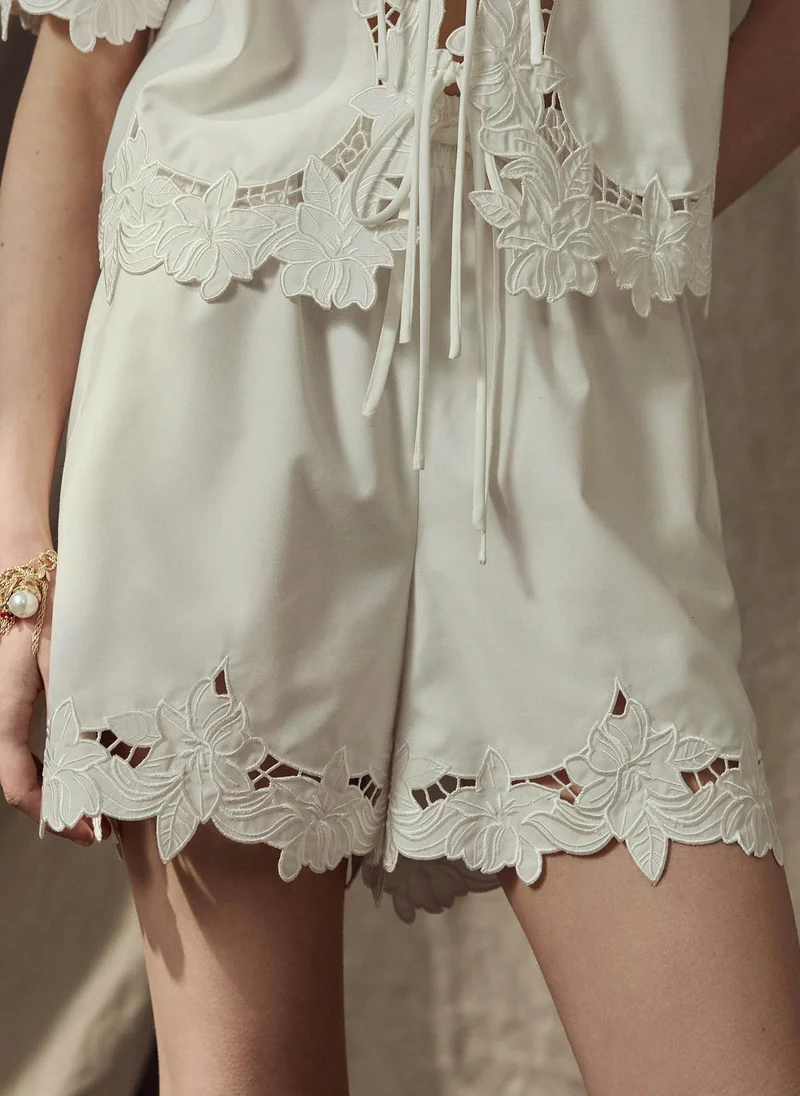 Mini shorts with lace detailing