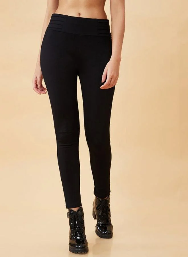 جلو باص بنطال تريقنز أسود مطاطي بقصة ضيقة للعمل
