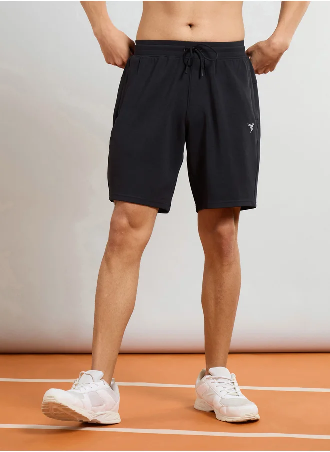 تكنوسبورت Men Solid Slim Fit Sports Shorts with TS Flexi