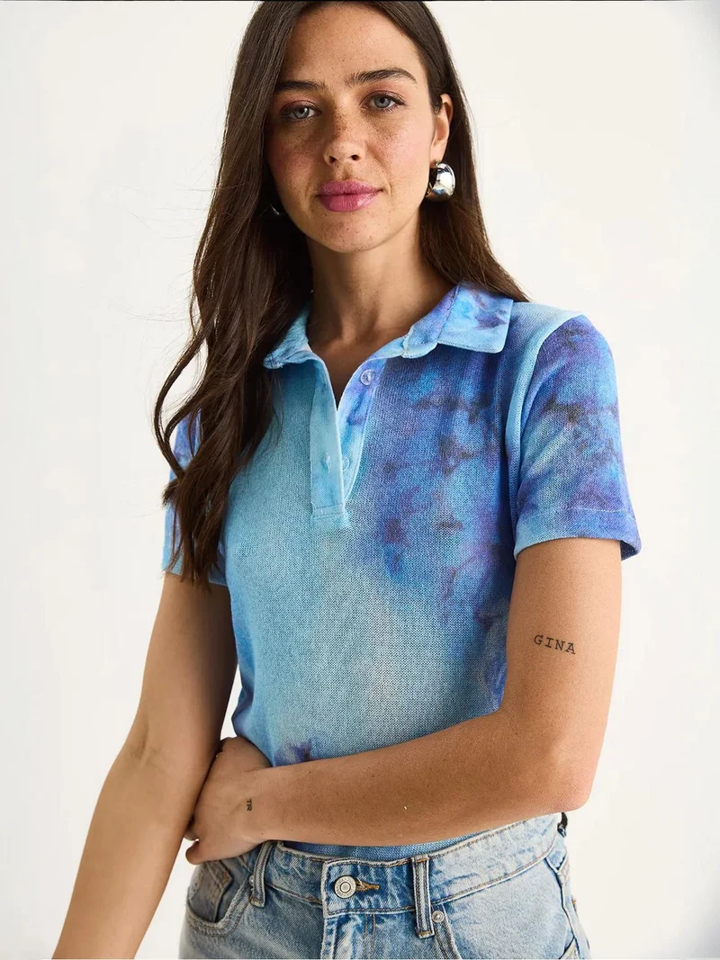 بيانكو لوتشي بلوزة بولو لوكسي بنقشة الزهور