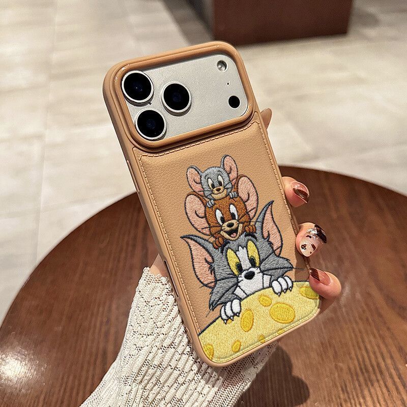 Apple iPhone 17 Pro phone case with cute brown cartoon design featuring a mouse and cat for drop protection
