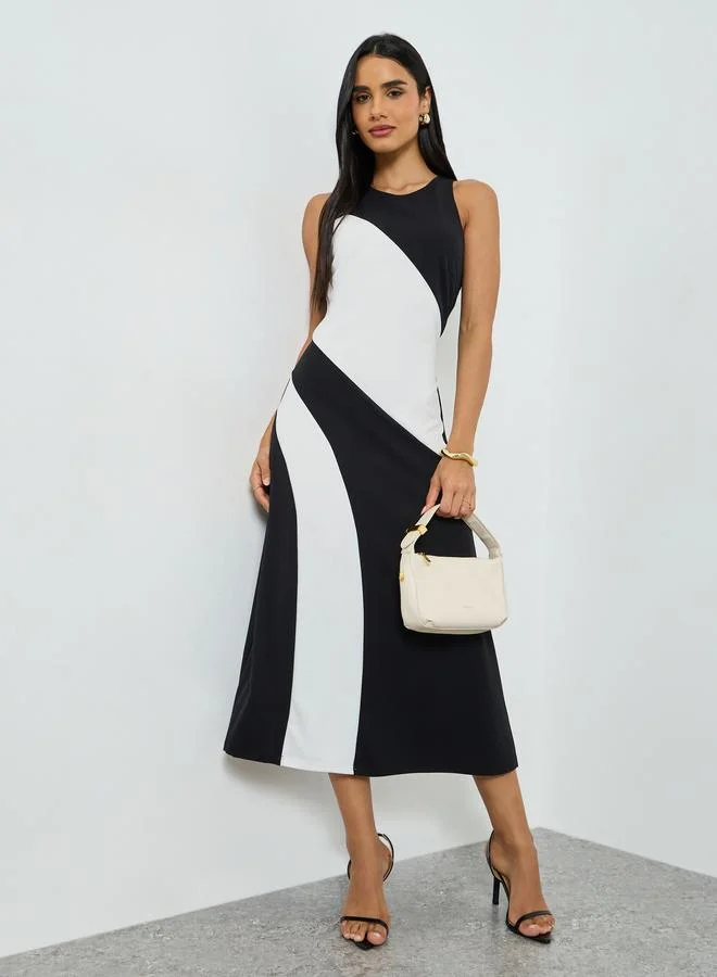 تايك تو فستان ميدي بلا أكمام ونمط كتل الالوان