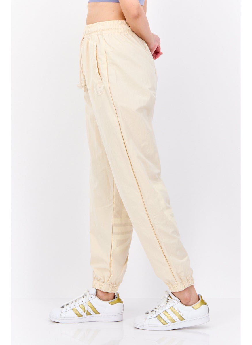 adidas Originals - Women Sportswear Fit Brand Logo Training Sweatpants, Cream - Image 1