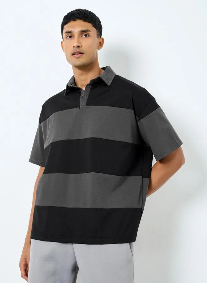 Styli Men Black Striped Oversized Polo T-Shirt