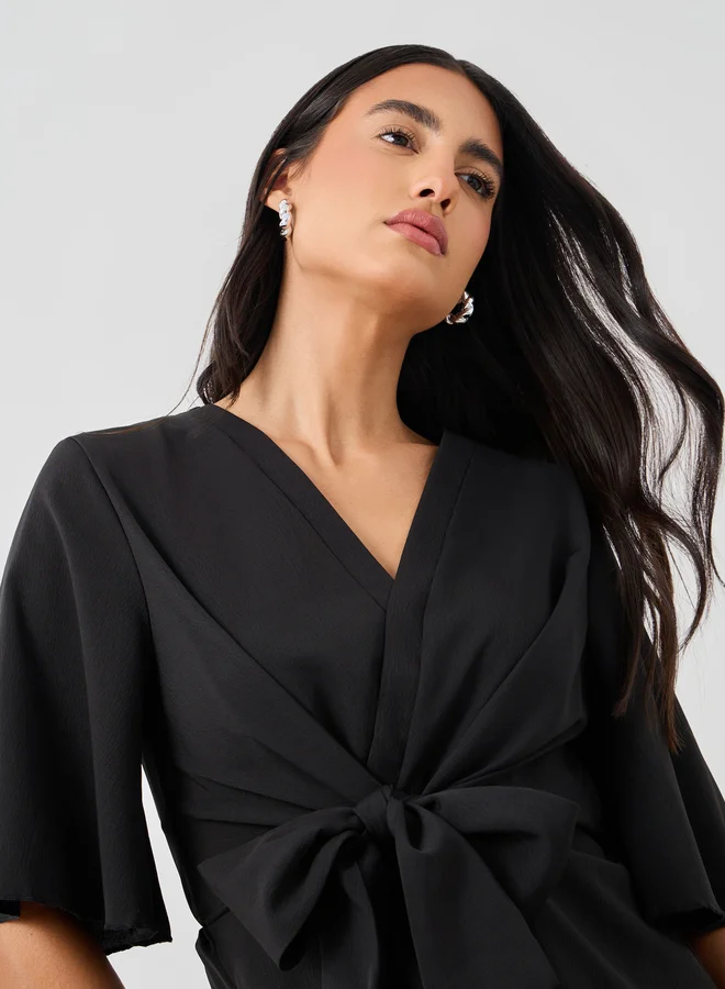 Styli Solid V-Neck Tie-Up Waist Blouse