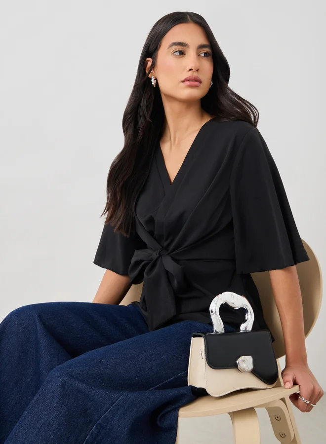 ستايلي Styli Solid V-Neck Tie-Up Waist Blouse