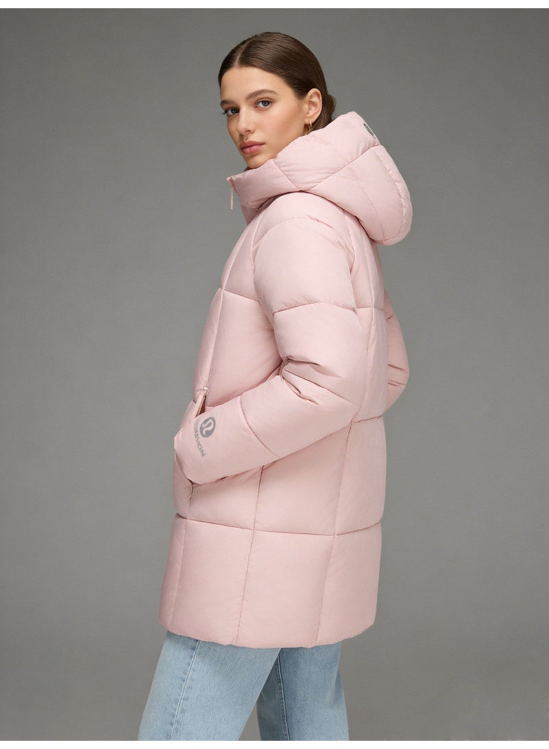 Lululemon Longline padded hooded cotton jacket - Women's light pink warm winter coat with quilted design and zippered pockets, very warm and lightweight, super soft - Image 1