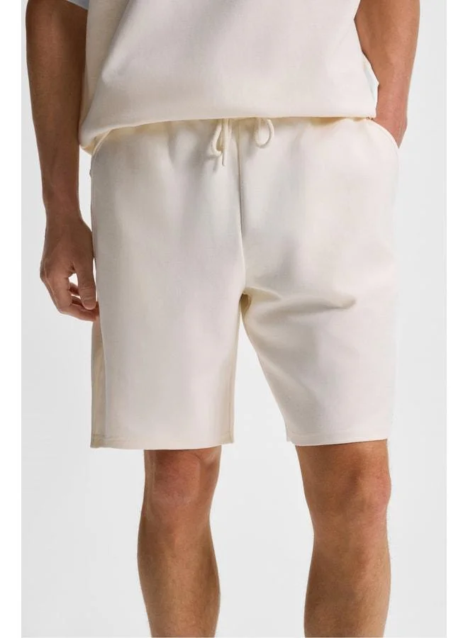 Grimelange BAILEY Men's Elastic Waist Single Back Pocket Corded Relaxed Fit Khaki Shorts.