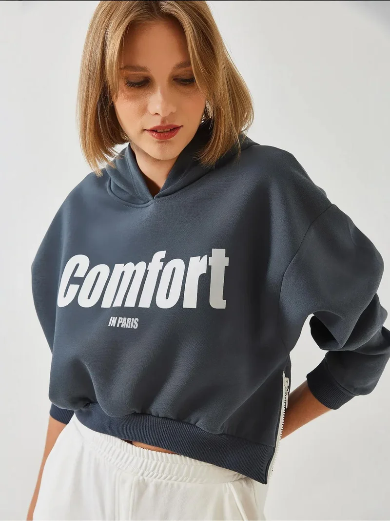 Bianco Lucci LUCCI Hooded Oversized Crop Sweatshirt with Pompom