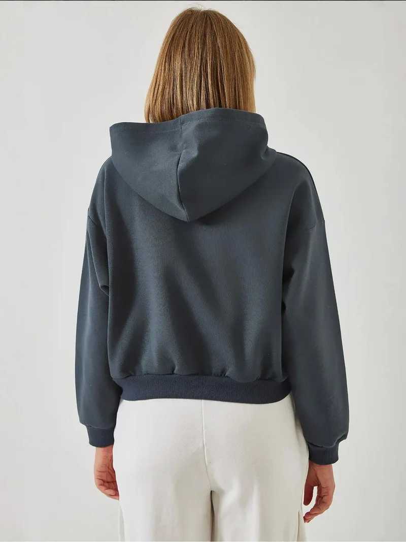 Bianco Lucci LUCCI Hooded Oversized Crop Sweatshirt with Pompom