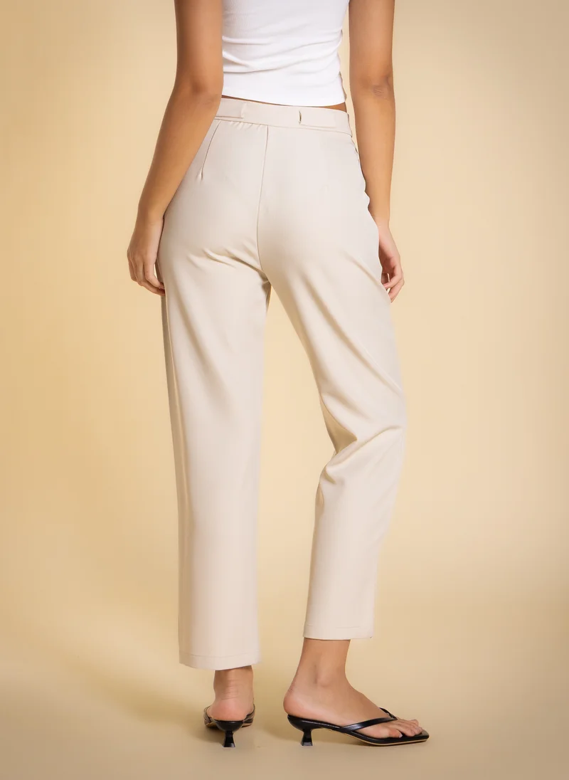 Shapes Beige PLEATED TAILORED TROUSERS for Women | Best Price UAE