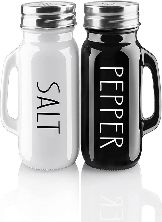 KITOME Salt and Pepper Shakers Set – Ceramic Spice Dispensers with Stainless Steel Lids & Handles, Black & White, 2-Piece Kitchen Dining Set - Image 1