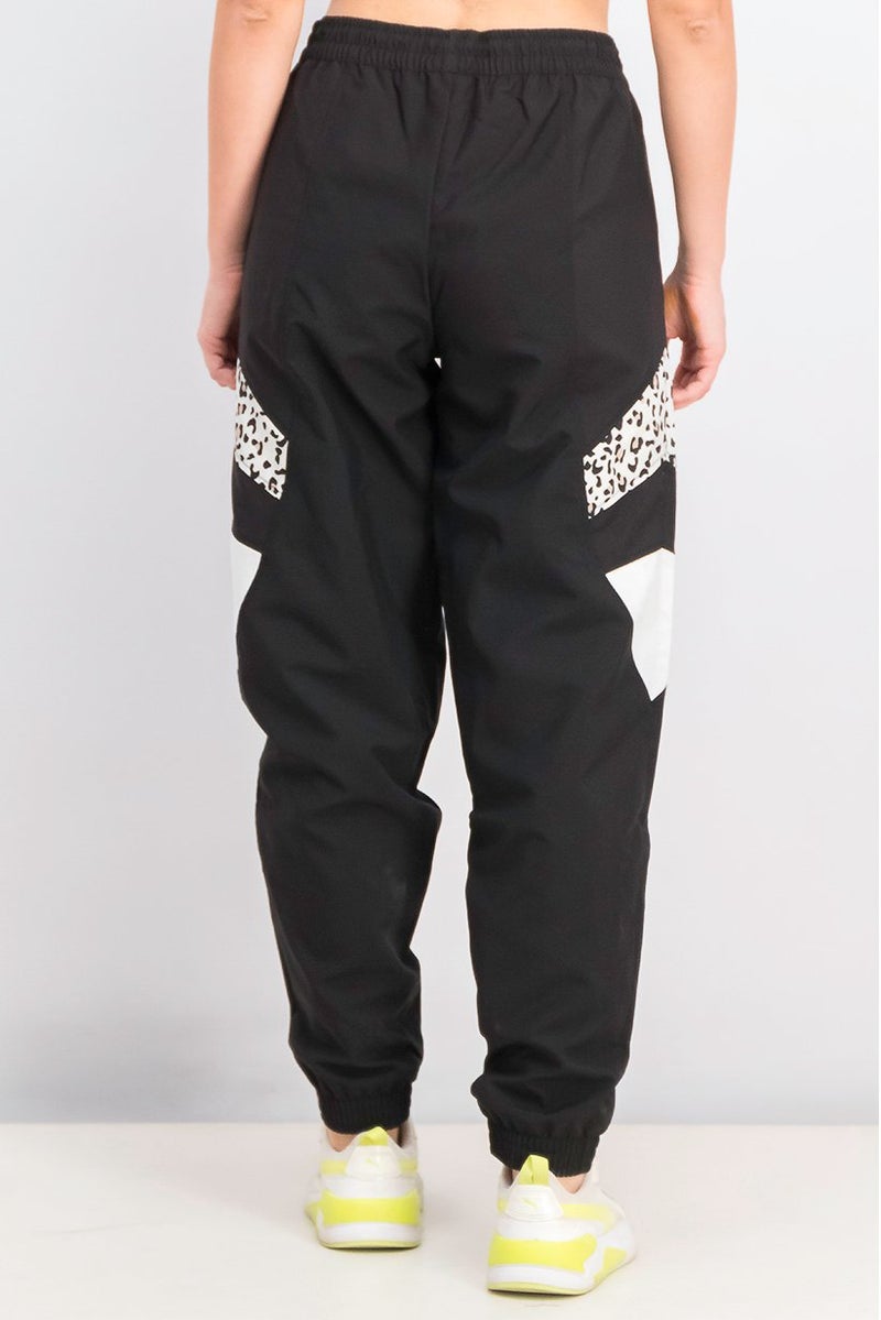 PUMA Women Sportswear Fit Brand Logo Outdoor TFS Track Pants, Black - Image 4