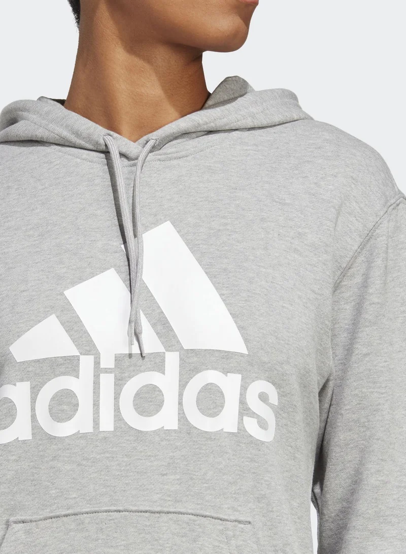 adidas هودي اساسي من نسيج تيري الفرنسي بقصة عادية مزين بشعار كبير