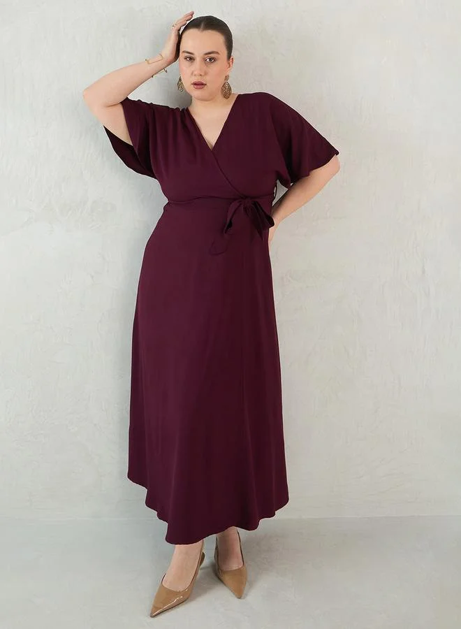 Femmella Plus Size Flared Sleeves Wrap Look A-Line Maxi Dress by Styli
