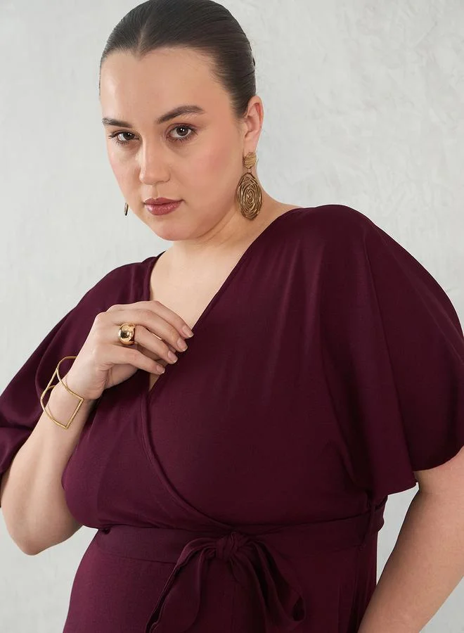 Femmella Plus Size Flared Sleeves Wrap Look A-Line Maxi Dress by Styli