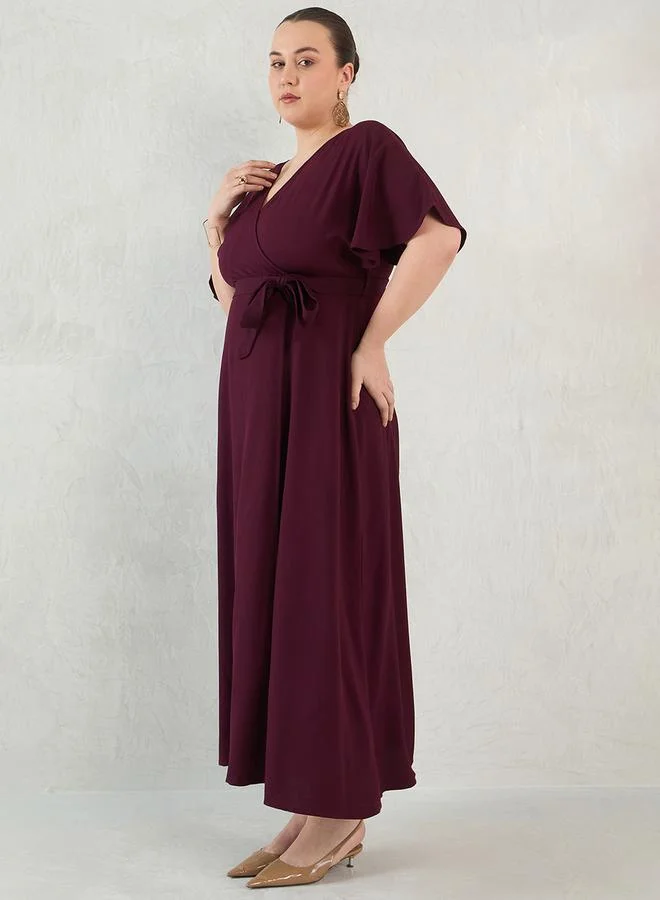 Femmella Plus Size Flared Sleeves Wrap Look A-Line Maxi Dress by Styli
