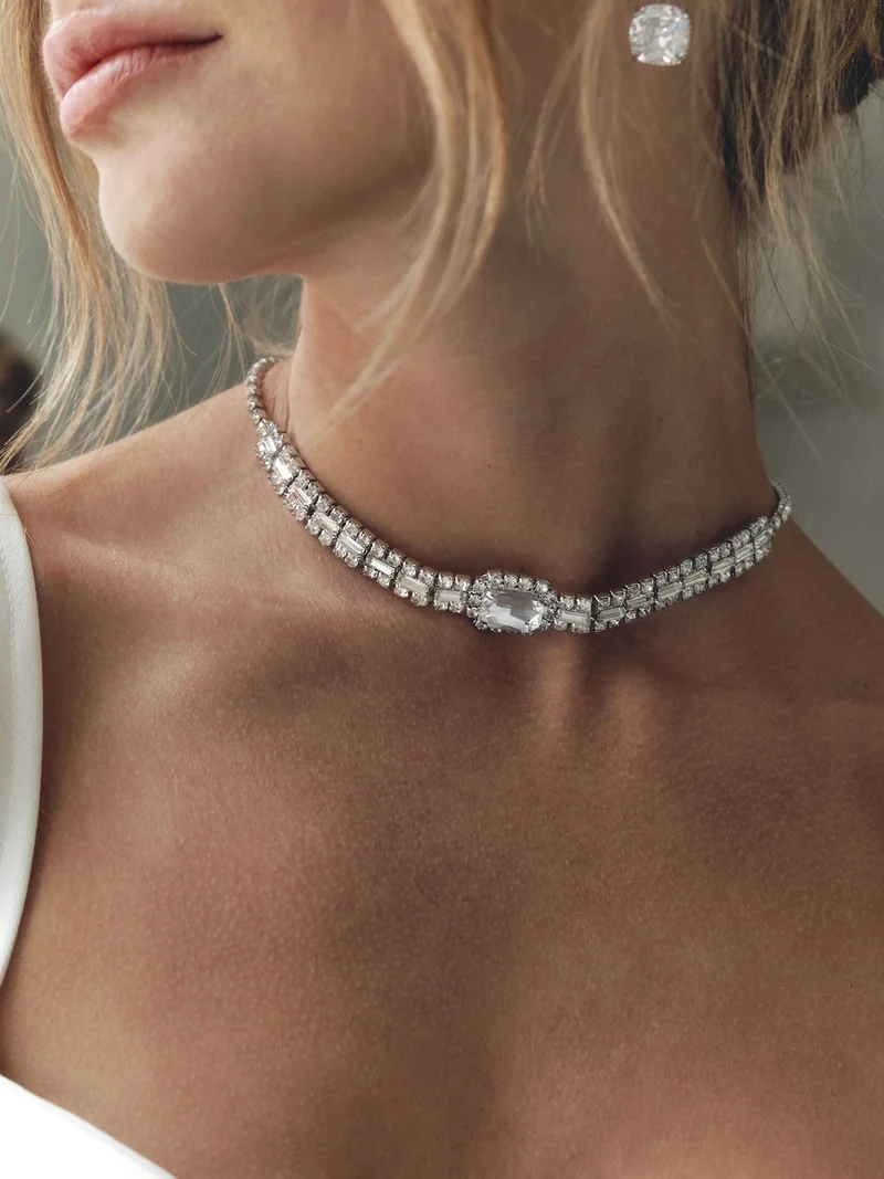 Silvery necklace with different sized rhinestones