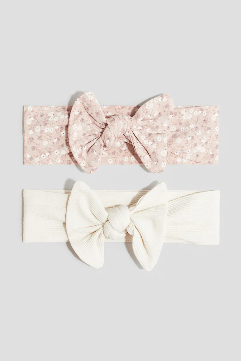 اتش اند ام أطواق شعر مزيّنة بعقدة - عبوة من قطعتين