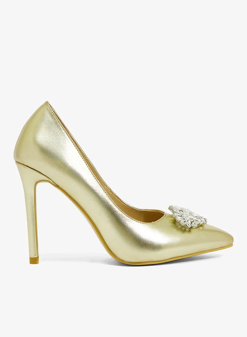 Gold metallic pump with crystal floral embellishment, pointed toe, stiletto heel